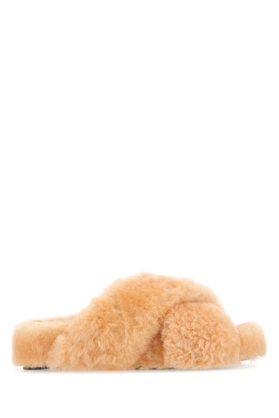 Jil Sander Comfortable Shearling Slides With A Playful Touch In Orange