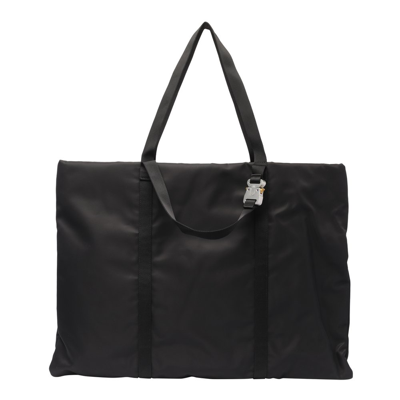 Shop Alyx 1017  9sm Buckle Detailed Top Handle Bag In Black
