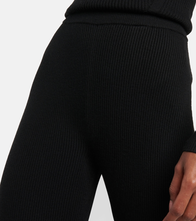 Shop Joseph Wool-blend Knit Flared Pants In Black