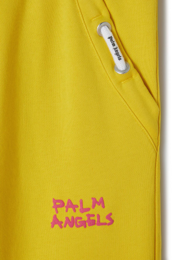 Shop Palm Angels Logo-print Cotton Track Pants In Yellow