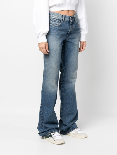 Shop Off-white Low-rise Flared Jeans In Blue