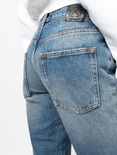 Shop Off-white Low-rise Flared Jeans In Blue