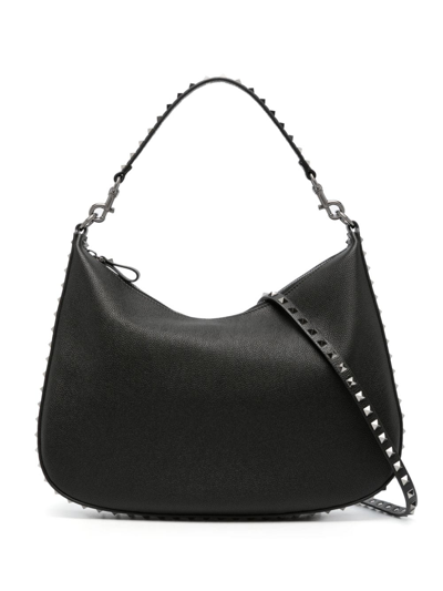 Shop Valentino Rockstud Leather Crossbody Bag In Schwarz