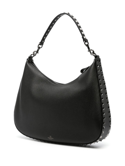 Shop Valentino Rockstud Leather Crossbody Bag In Schwarz