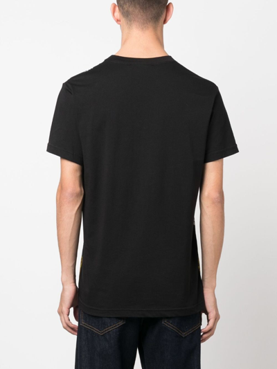 Shop Versace Jeans Couture Graffiti-print Cotton T-shirt In Black