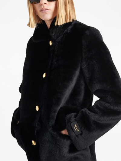 Shop Prada Shearling Fur Coat In Schwarz
