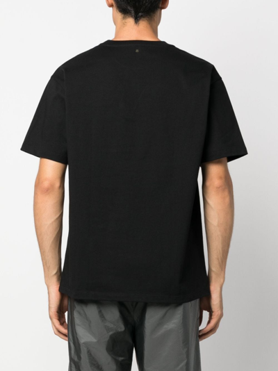 Shop Valentino Roman Stud-detail Cotton T-shirt In Schwarz