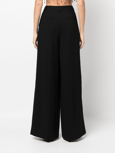 Simkhai Sanaz Pleated Palazzo Pants In Schwarz