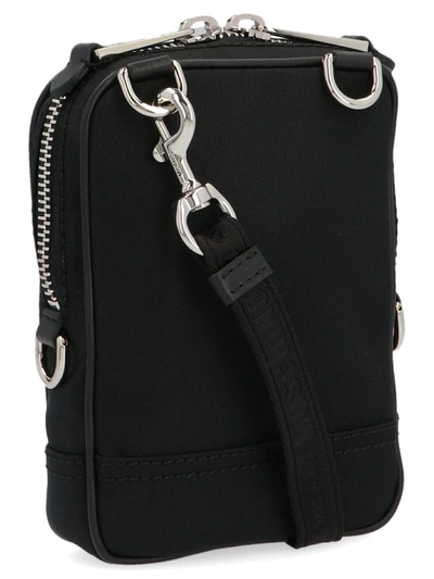 Shop Moschino 'label' Crossbody Bag In Black