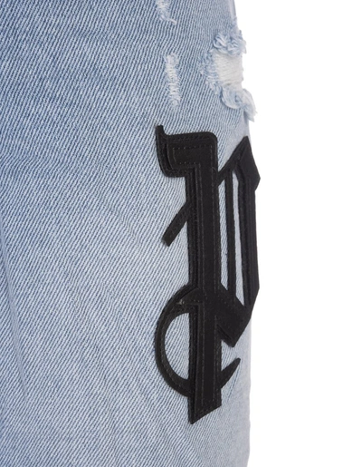 Shop Palm Angels Jeans With Logo Patches In Blue