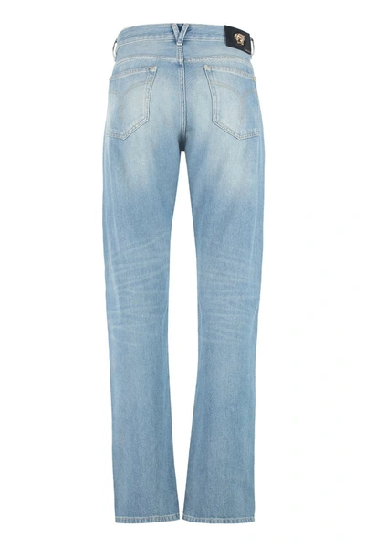 Shop Versace 5-pocket Straight-leg Jeans In Denim