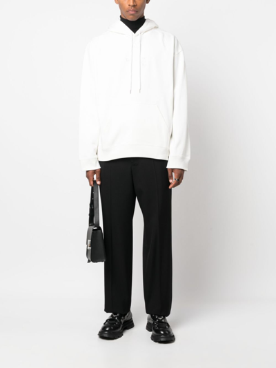Shop Courrèges Slogan-embroidered Jersey Hoodie In White