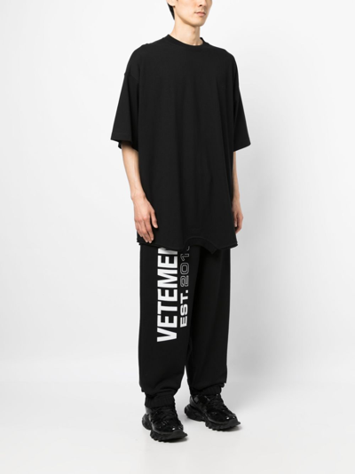 Shop Vetements Logo-embroidered Cotton T-shirt In Black