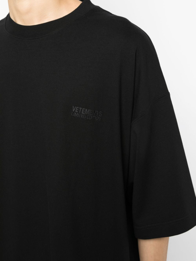 Shop Vetements Logo-embroidered Cotton T-shirt In Black