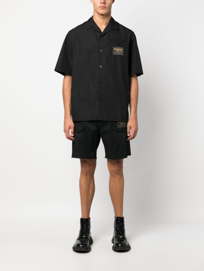 Shop Moschino Logo-patch Gabardine Shorts In Black