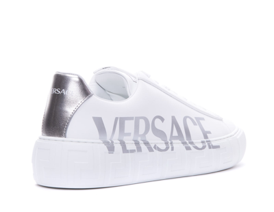 Shop Versace Logo La Greca Sneakers In White