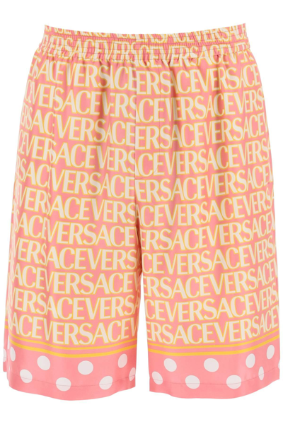 Shop Versace Allover Silk Shorts In White,yellow,pink