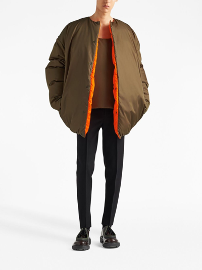 Prada Men Re-nylon Logo Padded Top In Brown
