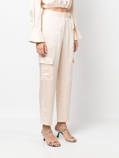 Shop Simkhai Satin-finish Cropped Trousers In Nude