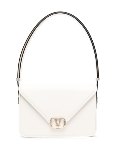 Shop Valentino Letter Leather Crossbody Bag In Nude