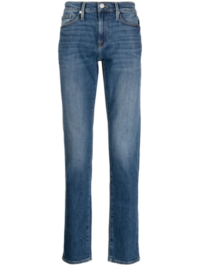 Shop Frame Mid-rise Slim-fit Jeans In Blue