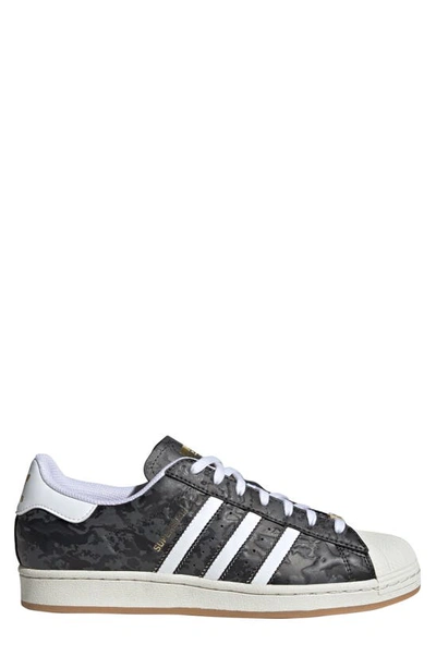 Shop Adidas Originals Superstar Lifestyle Sneaker In Black/ White/ Off White