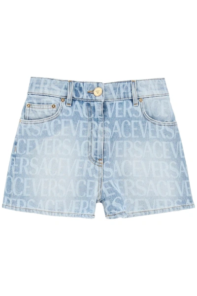 Shop Versace Logo Denim Shorts