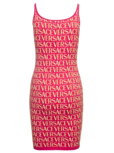 Shop Versace Mini Fuchsia Dress With All-over Logo Lettering Print And Medusa Detail In Cotton Blend Woman In Fuxia