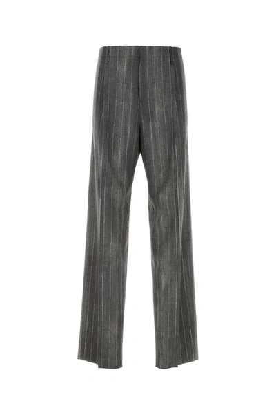 Shop Versace Pants In Stripped