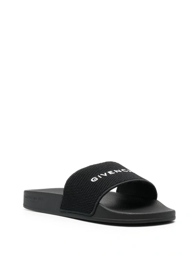 Shop Givenchy Logo Flat Mules In Black