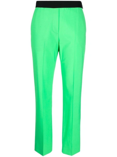 Shop Msgm Trousers In Tropical Green