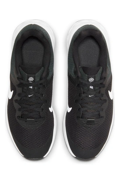Shop Nike Kids' Revolution 6 Sneaker In Black/ White