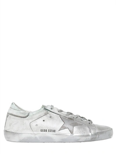 Shop Golden Goose Super Star Metallic Leather Sneakers In White/silver