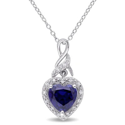 Mimi & Max 2 1/4 Ct Tgw Created Blue Sapphire Heart And 0.06 Ct Tw Diamond Twist Pendant With Chain In Sterling In Silver