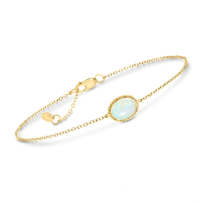 Shop Ross-simons Oval Opal Roped Frame Bracelet In 14kt Yellow Gold In White