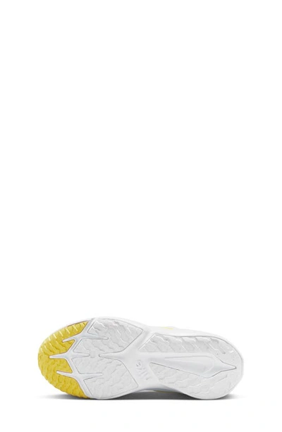 Shop Nike Kids' Star Runner 4 Sneaker In Summit White/ Yellow/ Sulfur