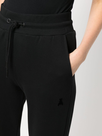 Shop Patrizia Pepe Logo-appliqué Organic Cotton Track Pants In Schwarz