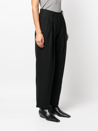 Totême Double-pleated Tailored Trousers In Black