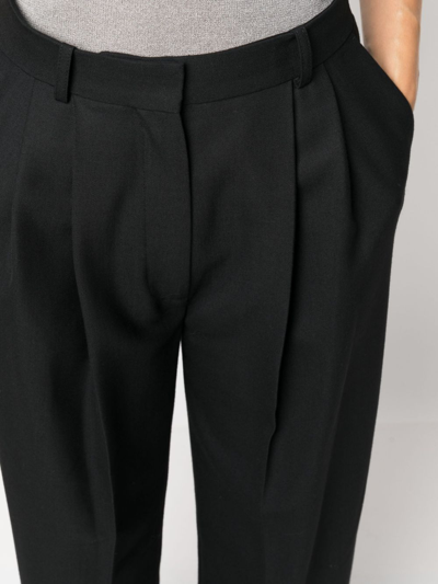 Totême Double-pleated Tailored Trousers In Black