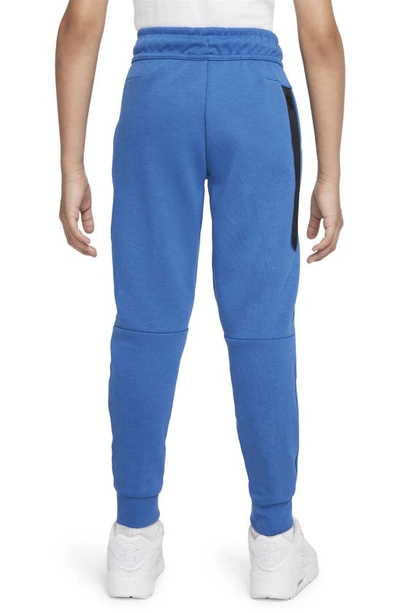 Shop Nike Tech Fleece Pants In Court Blue/ Orange/ Blackdnu