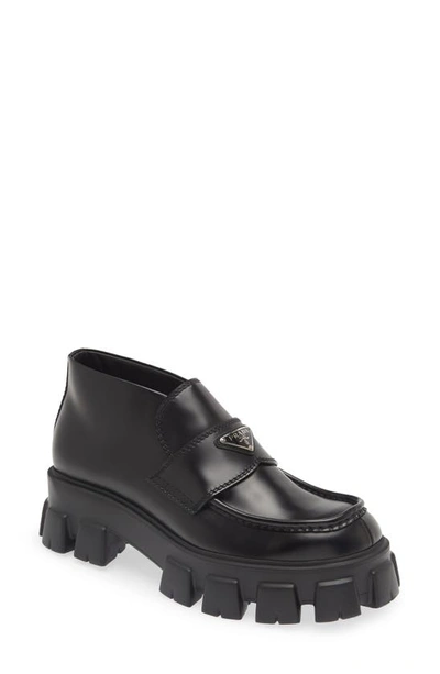 Shop Prada Monolith Lug Sole Chukka Loafer In Nero