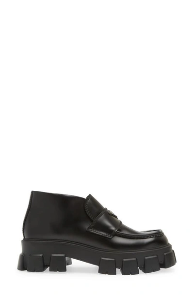 Shop Prada Monolith Lug Sole Chukka Loafer In Nero