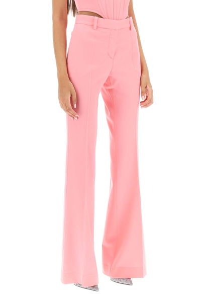 Shop Versace Low Waisted Flared Trousers Women In Pink