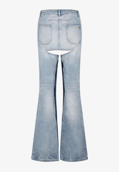 Shop Courrèges Chaps Jeans With Cut-out Detail In Light Blue