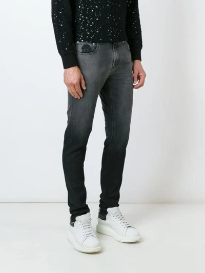 Shop Alexander Mcqueen Degrade Slim Fit Jeans - Black