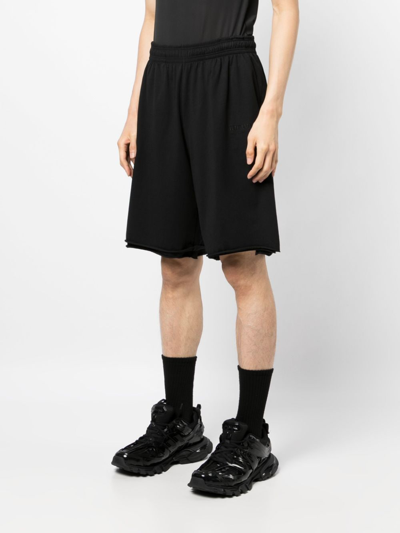 Shop Vetements Logo-embroidered Jersey Shorts In Black