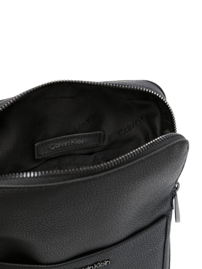Shop Calvin Klein Diagonal Flatpa Crossbody Bag In Black