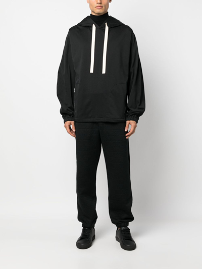 Moschino Logo-pattern Elasticated-waistband Track Pants In Schwarz