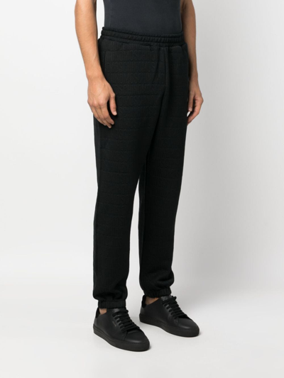 Moschino Logo-pattern Elasticated-waistband Track Pants In Schwarz
