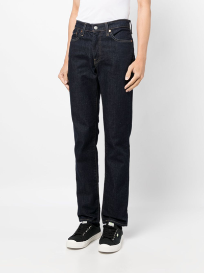 Shop Levi's Mid-rise Slim-fit Jeans In Blue